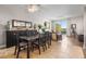 A modern living room and dining area with tile floors and plenty of natural light at 628 Cleveland St # 612, Clearwater, FL 33755