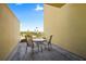 Outdoor patio featuring table and chairs and views of the city skyline at 628 Cleveland St # 612, Clearwater, FL 33755