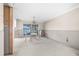 The dining area features water views visible through sliding glass doors at 6497 Cape Hatteras Ne Way # 3, St Petersburg, FL 33702