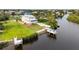 This waterfront property offers stunning views and easy access to the water from its private dock and lift at 8932 Rocky Creek Dr, Tampa, FL 33615