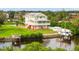 Two-story coastal home with a dock and waterfront access at 8932 Rocky Creek Dr, Tampa, FL 33615