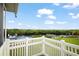 Enjoy a stunning water view from the home's balcony, creating a serene and picturesque setting at 8932 Rocky Creek Dr, Tampa, FL 33615