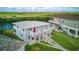Two story duplex features an open balcony, large front yard, and waterway access at 8940 Rocky Creek Dr, Tampa, FL 33615