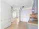Open concept kitchen features neutral tiling and natural light at 8940 Rocky Creek Dr, Tampa, FL 33615
