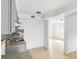 Bright kitchen boasts sleek countertops, mosaic backsplash and an open layout at 8940 Rocky Creek Dr, Tampa, FL 33615