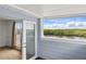 Balcony with blue siding and beautiful canal view at 8940 Rocky Creek Dr, Tampa, FL 33615