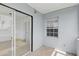 Patio featuring blue siding, tile floor and a window at 8940 Rocky Creek Dr, Tampa, FL 33615