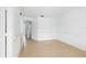 Bright, empty room features neutral tiling and simple design at 8940 Rocky Creek Dr, Tampa, FL 33615