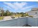Balcony view of the neighborhood featuring green lawn, street, and parked vehicles at 8940 Rocky Creek Dr, Tampa, FL 33615