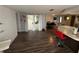Inviting living space with open floor plan and sliding door access to the lanai at 9815 Wayside Ln, Port Richey, FL 34668