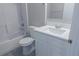 Bathroom with white vanity, a toilet and a bathtub-shower combination at 10728 Navigation Dr, Riverview, FL 33579