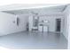 The expansive garage includes a washer, a dryer, and gray concrete flooring at 10728 Navigation Dr, Riverview, FL 33579