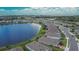 Aerial view of the community with a pond behind the homes at 11773 Little River Way, Parrish, FL 34219