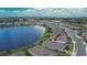 Aerial view of the community with a pond behind the homes at 11773 Little River Way, Parrish, FL 34219