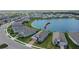 Wide aerial view of a large planned community situated on a lake with many modern homes and lush landscaping at 11773 Little River Way, Parrish, FL 34219