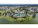 Aerial view of Brightwood's community with pool, playground, and green spaces, perfect for families at 11773 Little River Way, Parrish, FL 34219