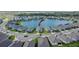 Aerial view of home within the community, pointing to the house's location near the lake at 11773 Little River Way, Parrish, FL 34219