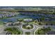 Aerial view of Brightwood's community with winding roads, lush landscaping, and pristine lakes at 11773 Little River Way, Parrish, FL 34219