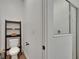 Clean bathroom featuring a toilet, shelving unit, and a glass-enclosed shower at 11773 Little River Way, Parrish, FL 34219
