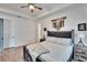 Comfortable main bedroom with stylish decor, soft lighting, and modern furniture creating a peaceful retreat at 11773 Little River Way, Parrish, FL 34219