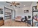 Cozy home office featuring neutral walls, built in shelving, and great light exposure at 11773 Little River Way, Parrish, FL 34219