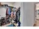 Spacious walk-in closet with organized shelving for clothes, shoes, and accessories, maximizing storage at 11773 Little River Way, Parrish, FL 34219