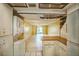 Open concept eat-in kitchen looking into a living room with natural light and sliding doors to outside at 122 N Kings Ave # 101, Brandon, FL 33510