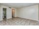 Bright, tiled living area with closet and access to bathroom at 122 N Kings Ave # 101, Brandon, FL 33510