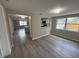 Dining area overlooking updated kitchen with kitchen island and newer appliances at 12801 College Hill Dr, Hudson, FL 34667