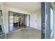Enclosed porch with sliding door to living room and view of lake at 13512 Palmwood Ln # 13512, Tampa, FL 33618
