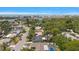 Lovely aerial shot showcases a neighborhood's proximity to the ocean, blending residential charm with scenic waterfront views at 14199 82Nd Avenue, Seminole, FL 33776