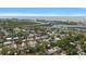 Aerial view of a residential neighborhood near the coast, showcasing the proximity to the beach and city at 14199 82Nd Avenue, Seminole, FL 33776