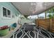 Charming patio setup featuring an outdoor seating area with a stylish rug, perfect for relaxation and entertaining at 14199 82Nd Avenue, Seminole, FL 33776