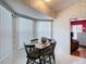 Charming dining area bathed in natural light, featuring a cozy table and bright windows at 2018 E Del Webb Blvd, Sun City Center, FL 33573