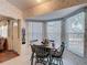 Bright dining nook with a quaint table and large windows, perfect for enjoying meals with a view at 2018 E Del Webb Blvd, Sun City Center, FL 33573