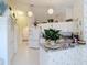 Bright kitchen featuring white cabinetry, modern appliances, and ample counter space for meal prep at 2018 E Del Webb Blvd, Sun City Center, FL 33573
