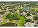 Aerial view showcases community, lakes and lush landscaping from above at 2220 Nantucket Dr # 43, Sun City Center, FL 33573