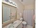 Neat bathroom with vanity, large mirror, and a shower-tub combination at 2220 Nantucket Dr # 43, Sun City Center, FL 33573