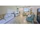 Inviting living room features neutral tones, comfortable seating, and an open layout to the dining area at 2220 Nantucket Dr # 43, Sun City Center, FL 33573