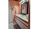 Bathroom with a white countertop, a sink, a mirror, and a tiled floor at 2704 E Montague E Ct, Clearwater, FL 33761
