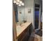 Bathroom with a sink, a mirror, and a shower at 2704 E Montague E Ct, Clearwater, FL 33761