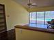 Living room with hardwood floors and pool view at 2704 E Montague E Ct, Clearwater, FL 33761