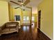 Living room featuring hardwood floors and ample lighting at 2704 E Montague E Ct, Clearwater, FL 33761