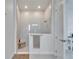 Sleek walk-in shower featuring glass enclosure and modern fixtures at 28847 Orange Berry Dr, Wesley Chapel, FL 33543