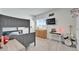 Bedroom features a bunk bed, dresser, desk, TV, and drum set for entertainment at 28847 Orange Berry Dr, Wesley Chapel, FL 33543