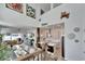 Bright living room with open concept kitchen and dining area at 28847 Orange Berry Dr, Wesley Chapel, FL 33543