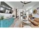 Open-concept living space with modern furnishings and stylish decor at 28847 Orange Berry Dr, Wesley Chapel, FL 33543