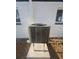 Energy-efficient air conditioner unit on a concrete platform at 342 51St N Ave, St Petersburg, FL 33703