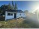 Charming single-story home with a fresh white exterior and green lawn at 342 51St N Ave, St Petersburg, FL 33703