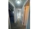 Hallway with tiled floors and multiple doorways at 342 51St N Ave, St Petersburg, FL 33703